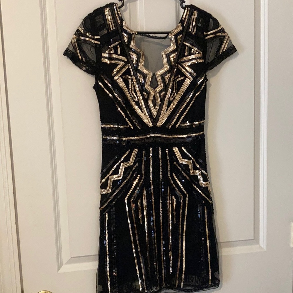 Black and gold sequin party dress